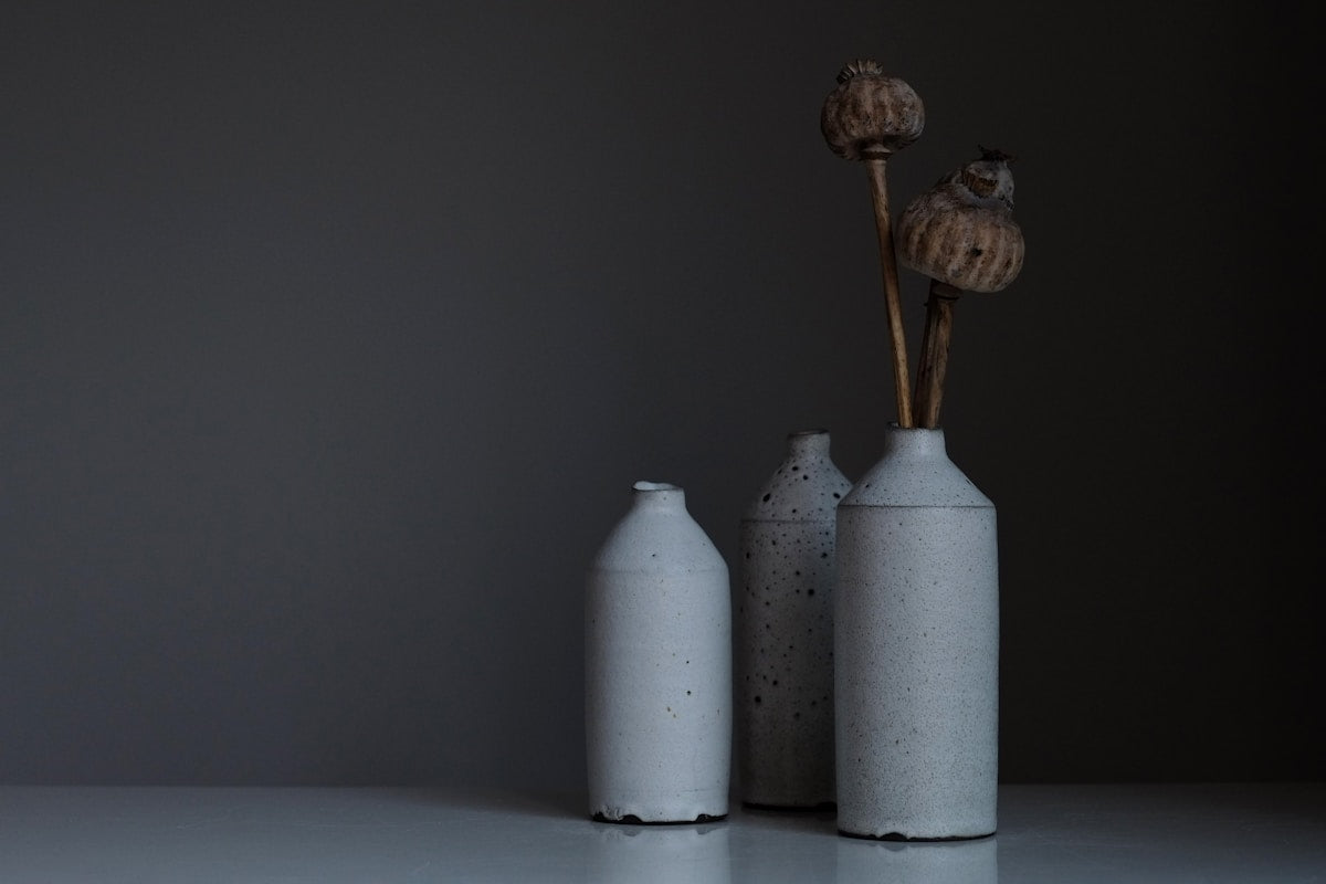 Artisan hands polishing a natural marble object to a mirror finish in a stone workshop